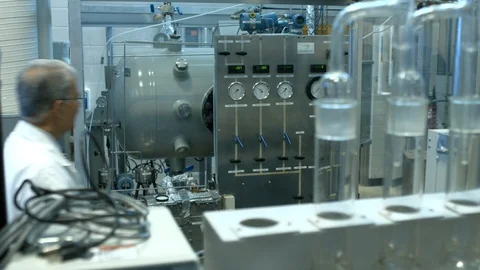Scientist working on machine Stock Footage 106898699