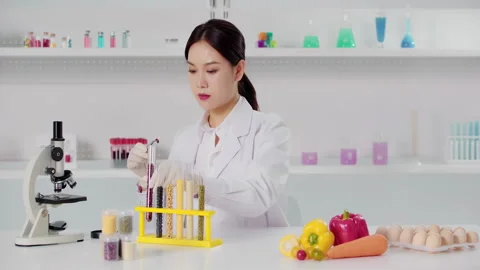 Scientist working with samples of different grains cereals for development of Stock Footage 328644373