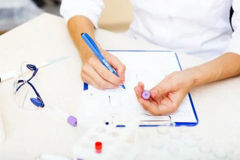 Scientist working with samples Stock Photos