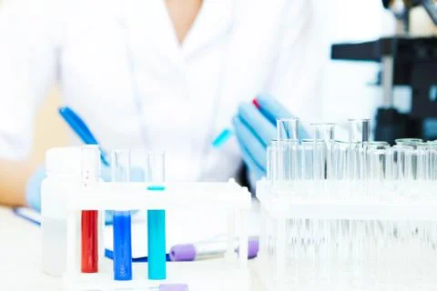 Scientist working with samples Stock-Fotos