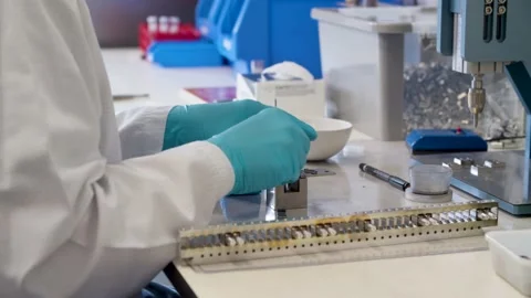 Scientist working at the Table in a Laboratory Stock-Footage 145055718