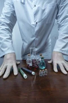 Scientist working with test tubes and colorful liquids in laboratory Stock Photos