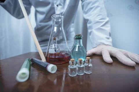 Scientist working with test tubes and colorful liquids in laboratory Stock Photos