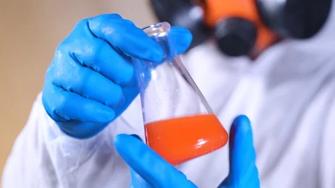 A scientist works in in a laboratory. Bio lab research. Science about DNA. Stock-Footage 122761573