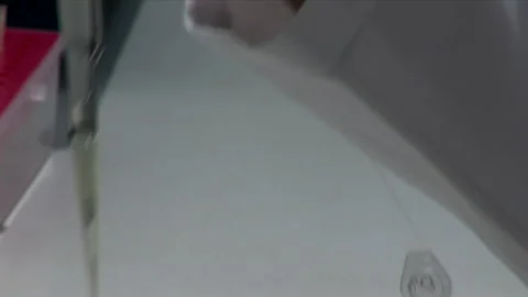 Scientist Works In Laboratory, Developing A Vaccine For Coronavirus Treatment. Stock Footage 147212438