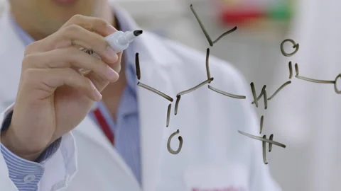 Scientist writing on glass Stock Footage 148796785