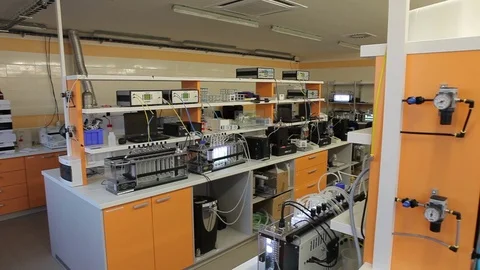 Scientists algae research laboratory technologies, bio reactors spectrometer Stock Footage