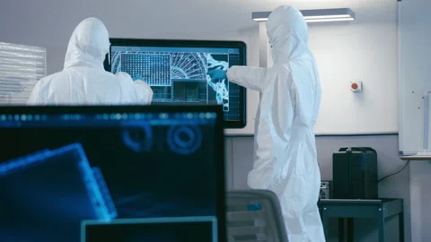 Scientists analyze data in laboratory Stock Footage 149243951