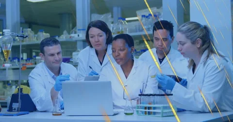 Scientists analyzing research data on laptop in laboratory, showing floating Stock Footage 307442206