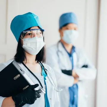 Scientists and doctors at work in laboratory Stock Photos