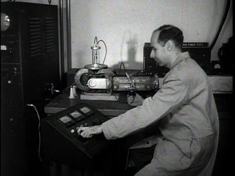 Scientists and engineers study electronics for radio, radar, television, Video stock 75296477