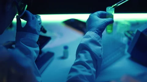 Scientists are analyzing samples in medical research laboratory. Scientific Stock Footage 168436453