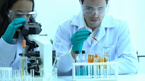 Scientists are experimenting with chemicals compound. Stock Footage 109153545