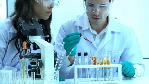 Scientists are experimenting with chemicals compound. Stock Footage 109156284