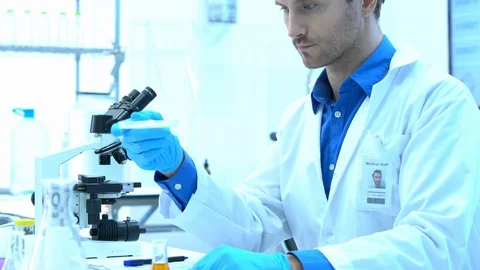 Scientists are experimenting with chemicals compound and absorb liquid Stock Footage 111665714