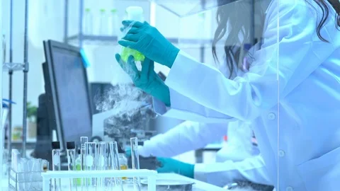Scientists are experimenting with chemicals compound and absorb liquid Stock Footage 111667070