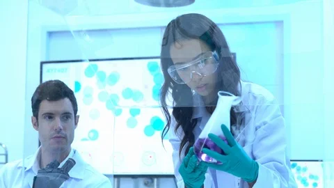 Scientists are experimenting with chemicals compound and absorb liquid Stock Footage 111667074