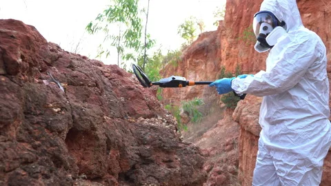 Scientists are using measuring tools to explore foreign objects in meteorite fra Stock Footage 300459085