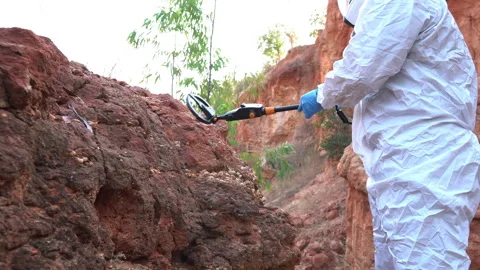 Scientists are using measuring tools to explore foreign objects in meteorite fra Stock Footage 300466858