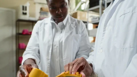 Scientists Assembling Robotic Prototype in Laboratory Video stock 343509237