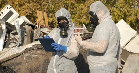 Scientists brought in test tubes and reagents, fill out protocol about pollution Stock Footage 119050146