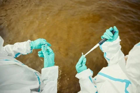Scientists Collecting Water Samples for Environmental Pollution Testing Stock Photos