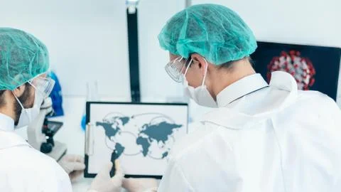Scientists discussing information about the spread of the coronavirus. Elements Stock Photos