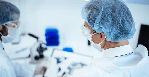 Scientists discussing information about the spread of the coronavirus. Elements Stock Photos