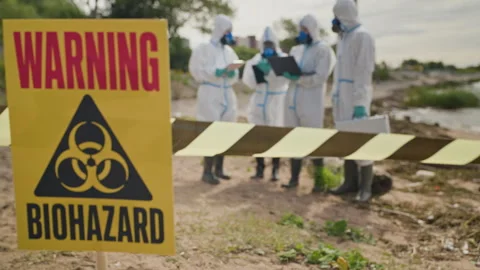 Scientists in Hazmat Suits Investigating Biohazard Disaster Zone Stock-Footage 344718862