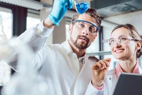Scientists in the lab obtaining experimental data Stock Photos