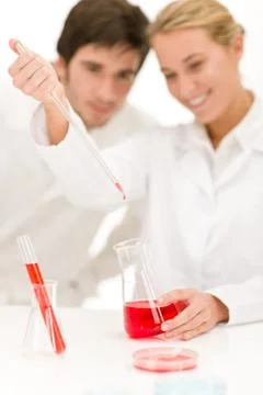 Scientists in laboratory - flu virus test tube Stock Photos