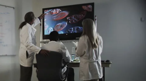 Scientists Look at Screen Stock Footage 62943134