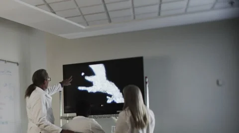 Scientists Look at Screen Stock Footage 62943830