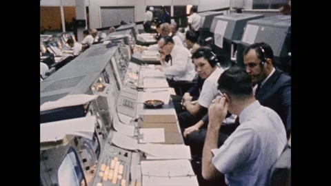 Scientists monitories spacecraft mission in control room - 2015 Stock Footage