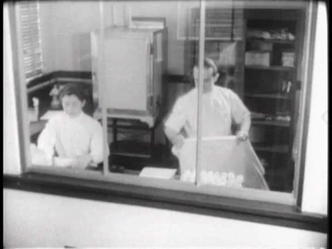 Scientists perform experiments on the Yellow Fever virus in a laboratory in the Stock Footage 75759727