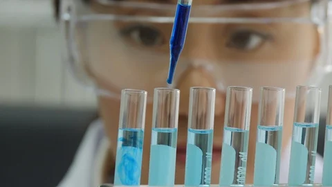Scientists performs medical tests in laboratory. Stock Footage 93824483