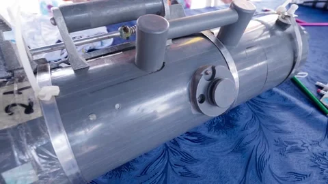 Scientists preparing a Niskin bottle for water sampling 스톡 동영상 310007622