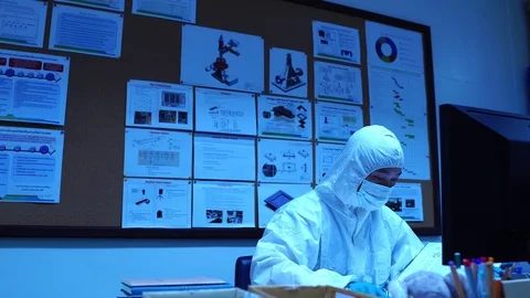 Scientists with protective clothing for work in laboratories  Stock Footage 115472937