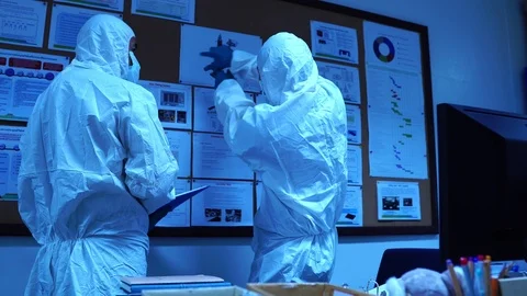 Scientists with protective clothing for work in laboratories  Stock Footage 115473079