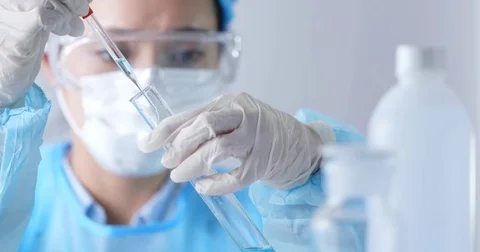 Scientists researching in laboratory Stock Footage 81500890