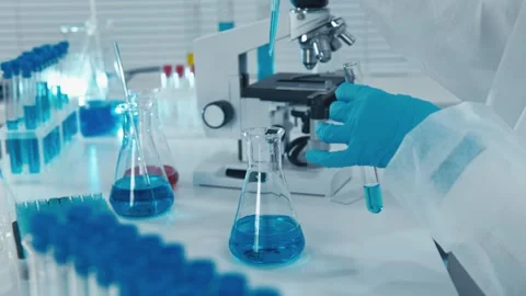 Scientists study genetic mechanisms and conduct research to uncover and treat Stock Footage 257619405
