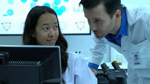Scientists team meeting and talking in laboratory Stock Footage 109148752