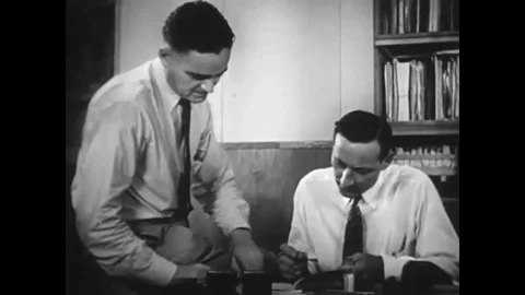 Scientists test the lasting strength of DDT in a lab in the 1940s. Stock Footage 141597999