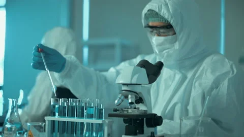 Scientists is testing for Covid-19 By using science tubes Stock Footage 146176622