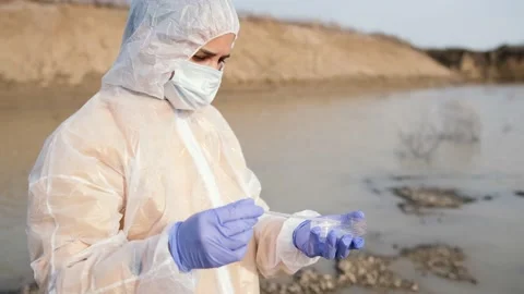 Scientists use sample pipettes for test tubes. For scientific water research Stock Footage 169359619