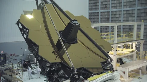Scientists work on James Webb Space Telescope in space center Stock Footage 97869688
