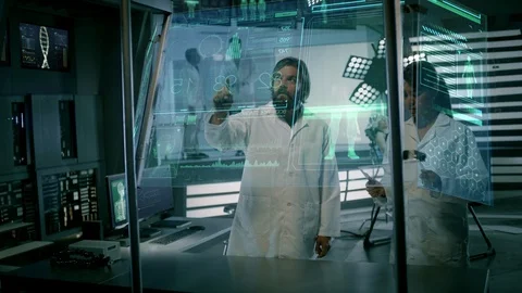 Scientists working on EEG Headset technology with female patient. Stock Footage 119984886