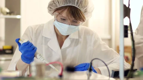 Scientists Working in Genetic Laboratory Stock Footage 37161735