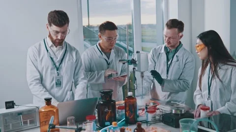 Scientists working inside laboratory. Ch... | Stock Video | Pond5