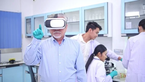 Scientists working in lab with VR headset portrait. Stock Footage 92396842
